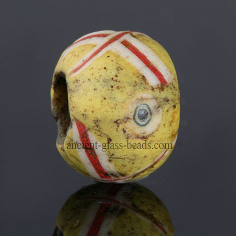 Ancient Roman mosaic glass eye bead with crossed trails, 1 century